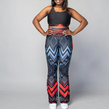 Load image into Gallery viewer, Soko Ankara Red flared leggings with bold African print design