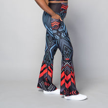 Load image into Gallery viewer, Soko Ankara Red flared leggings with bold African print design