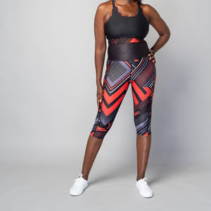 TYNA Soko Ankara Red Capris – women’s cropped gym leggings with red and black Ankara print