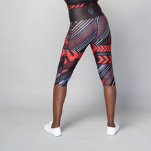 Load image into Gallery viewer, TYNA Soko Ankara Red Capris – women’s cropped gym leggings with red and black Ankara print