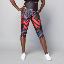 Load image into Gallery viewer, TYNA Soko Ankara Red Capris – women’s cropped gym leggings with red and black Ankara print
